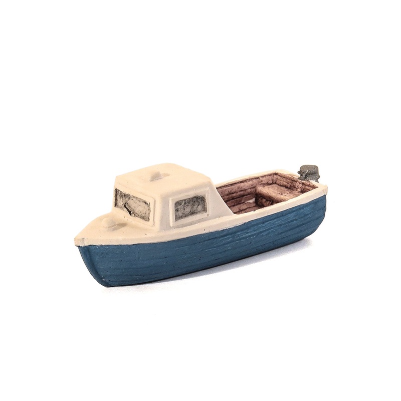Blue Motor Boat with small cabin