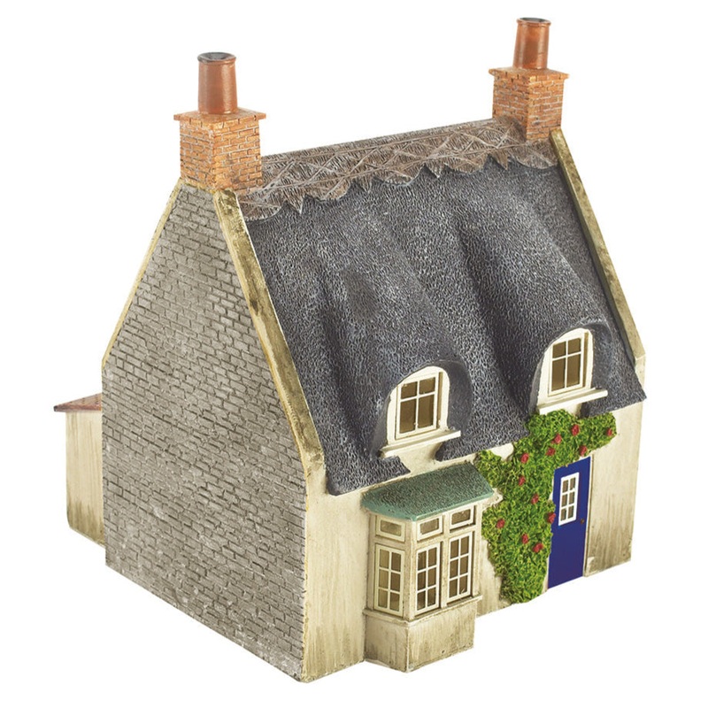 Thatched Cottage – Grey Stone & Blue Door
